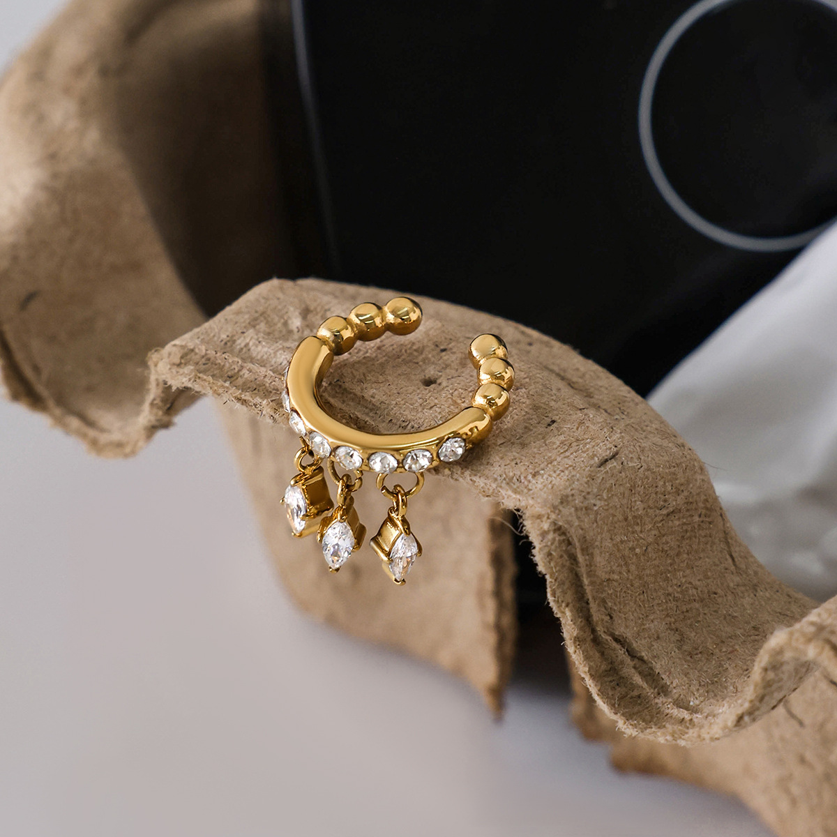 Wanxing ojos de caballo europeos y estadounidenses zircon orejas para mujeres sin agujeros de orejas pendientes de acero inoxidable de oro 18 quilates diseño de nicho de joyería transfronteriza