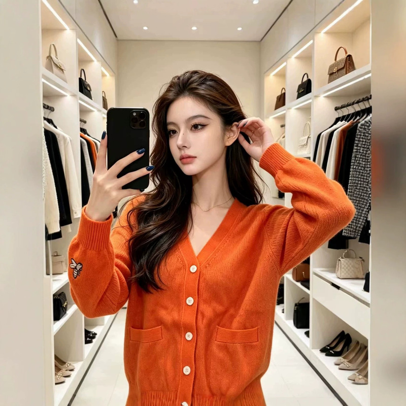 Korean-style orange knitted sweater for women, V-neck, single-breasted cardigan, available in physical stores, women's clothing, bulk purchase from 1688