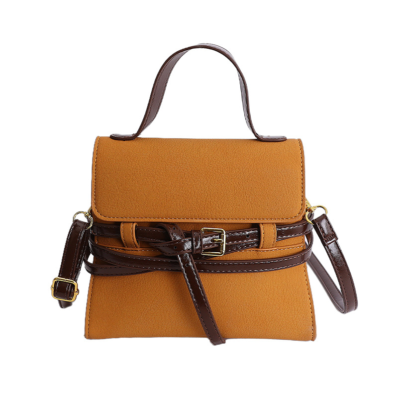 Bolsas de mano de nicho coreano de color contraste para mujeres 2026 primavera textura simple moda diaria correa de hombro mochila
