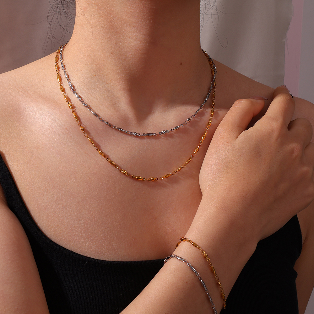 Exclusividad transfronteriza para INS Minimalista Cadena de semillas de melón de 18 quilates Collar de todo fósforo Conjunto de pulsera Fábrica de joyas al por mayor