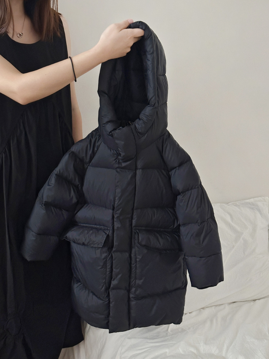 2023 nuevo oro negro chaqueta de los niños de los hombres y las mujeres de invierno de media longitud ropa de los niños nuevo estándar nacional 90 blanco pato abajo chaqueta al por mayor