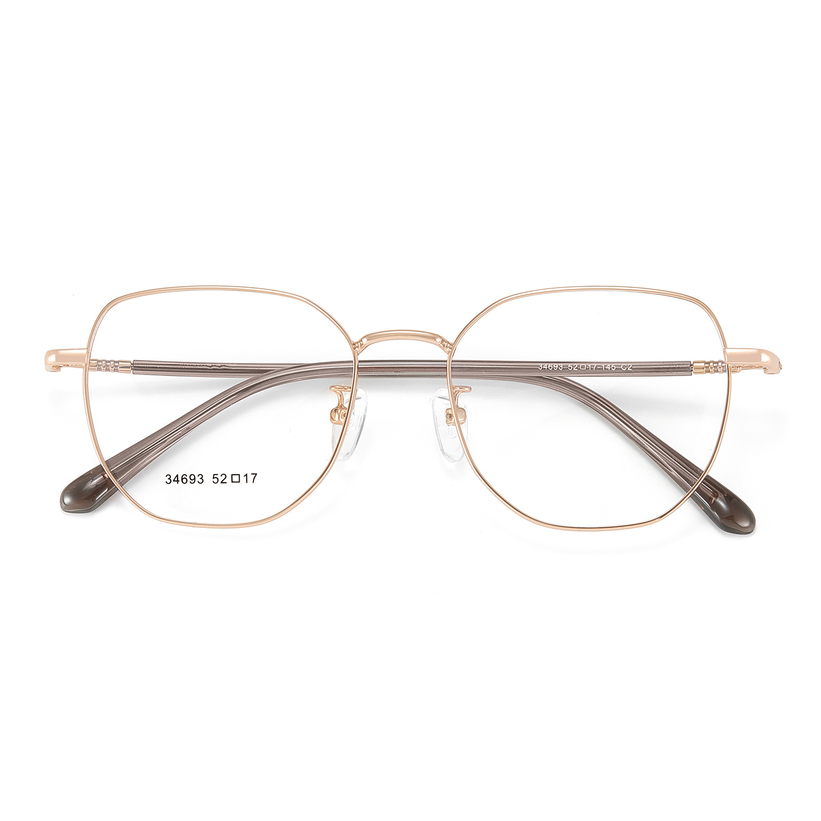 La cara de la piel simple es blanco, la cara es más limpia, el marco de gafas de aleación metálica es bicromático, el soporte de la nariz de la cara es un marco de gafas al por mayor.