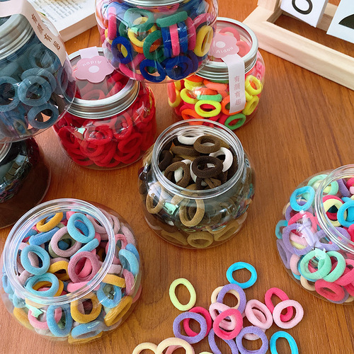 100 cans of candy-colored basic small children's finger towel rings that do not hurt hair and are versatile for girls to braid.