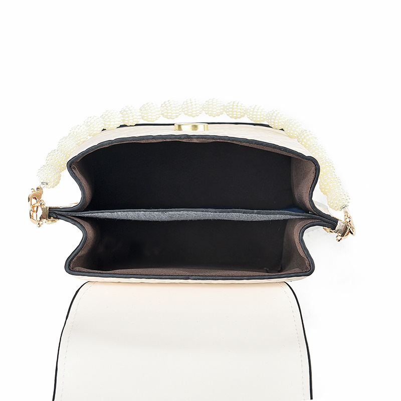 Otoño y invierno bolso de teléfono móvil de mujer 2025 nuevo estilo de moda bolso de hombro de moda universal mini bolso de aire exterior