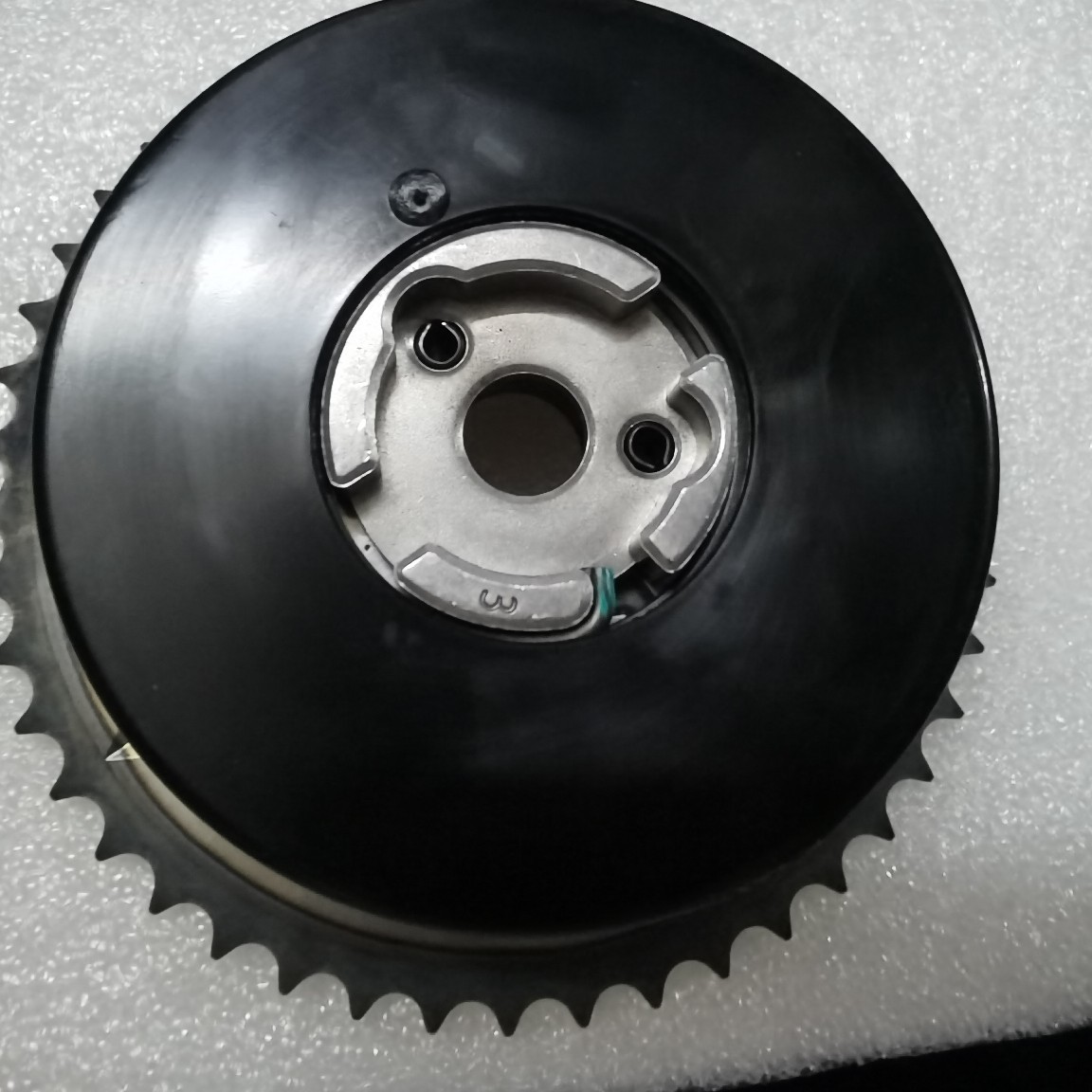Automobile engine eccentric shaft timing gear row suitable for Buick Regal Junyue Chevrolet pontik 12578516