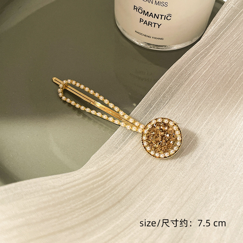 Corea del Sur clip para el cabello de perlas en línea clip para el cabello de mujeres rasgadas clip para el cabello de una palabra clip para el cabello de bordes fría BB clip lateral clip para el temperamento clip para la cabeza