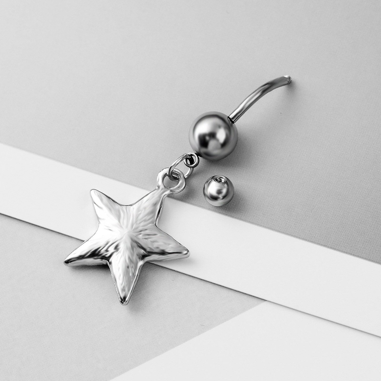 Piercing per ombelico in acciaio inox chirurgico a stella_voghion.com