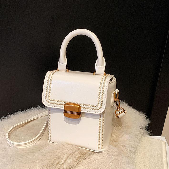 Retro versátil bolso de mano para mujeres 2025 nuevo nicho de alto nivel sensación de hombro mochila de moda bolso móvil