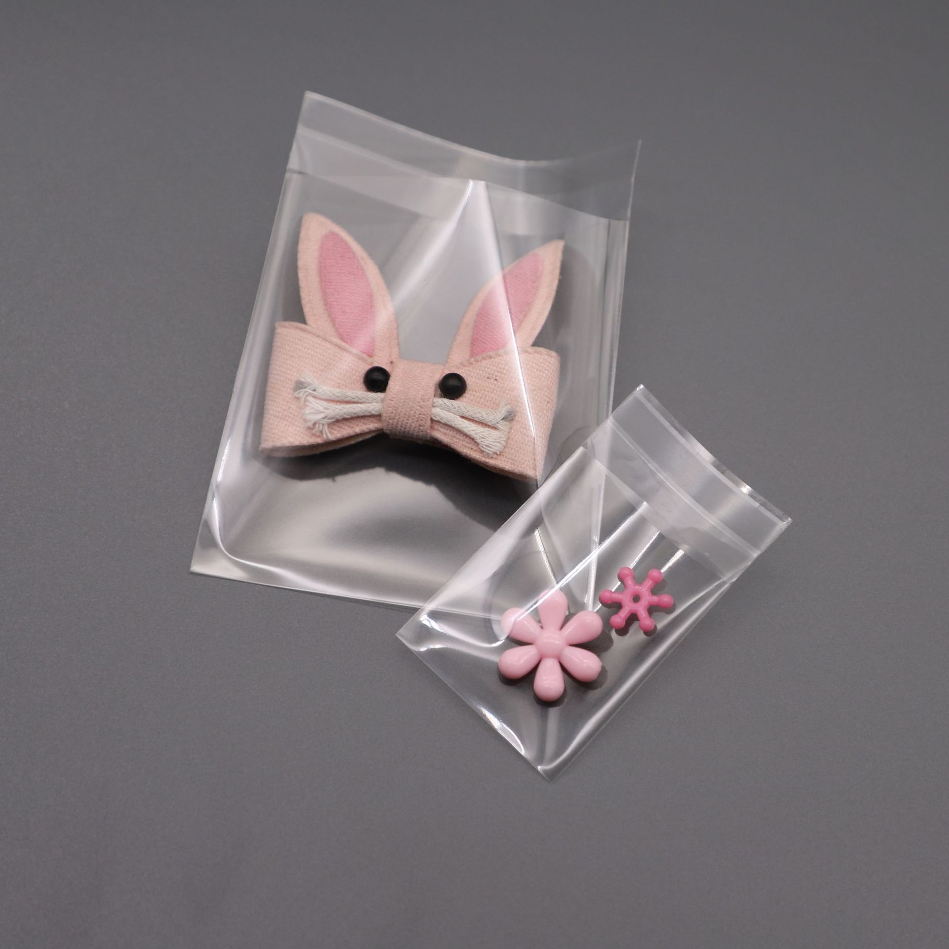 产地货源加厚透明OPP不干胶袋子发夹耳钉粘贴封口小号饰品袋