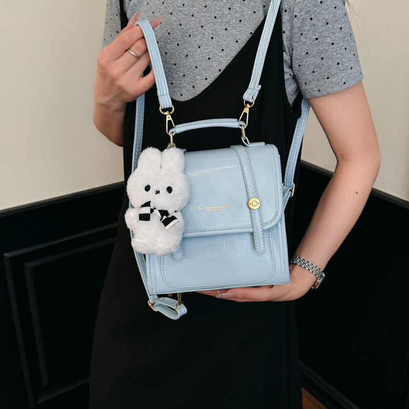 Cantos colgantes de dibujos animados de hombro pequeño bolso de mujer de verano estilo coreano nicho color sólido mochila mujer