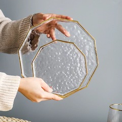 Minimalist and elegant gold-edged glass plate, a great choice for home office.