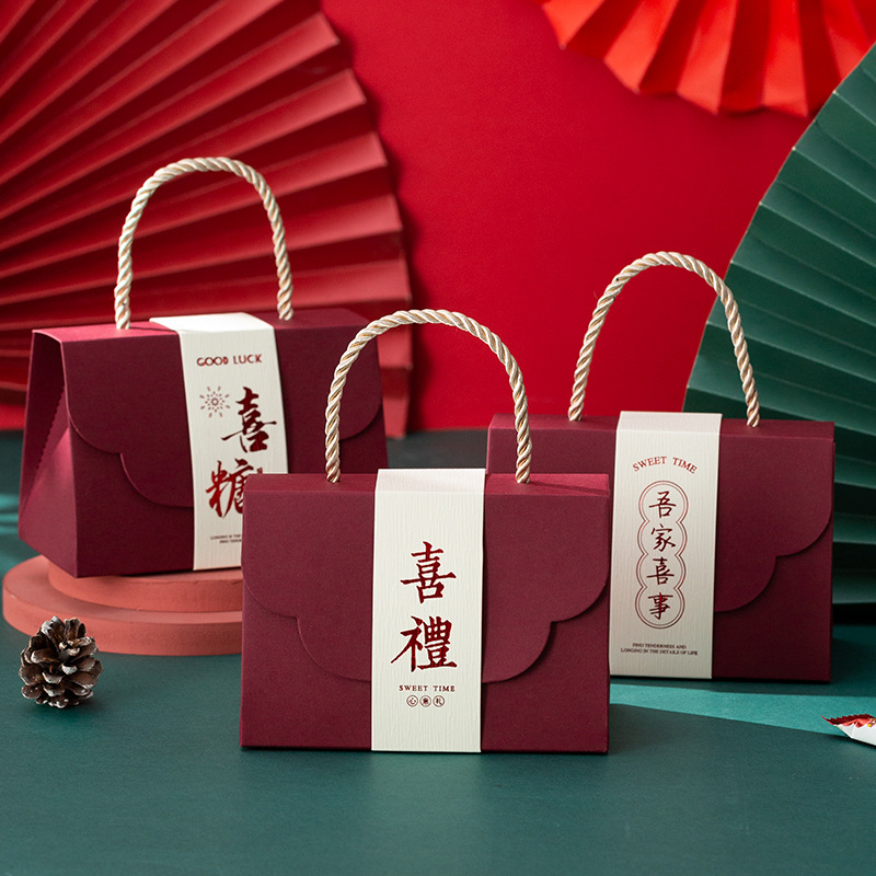 Wholesale creative Chinese-style wedding candy bags, engagement gift boxes, paper boxes, and wedding favor boxes.