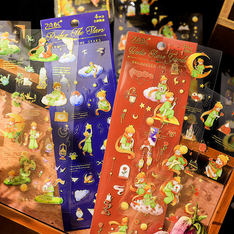 Encuentro con estrellas Pegatinas planas El principito estampado en caliente tridimensional Personaje de cuento de hadas Cuenta de mano Material de base Pegatinas 4 estilos