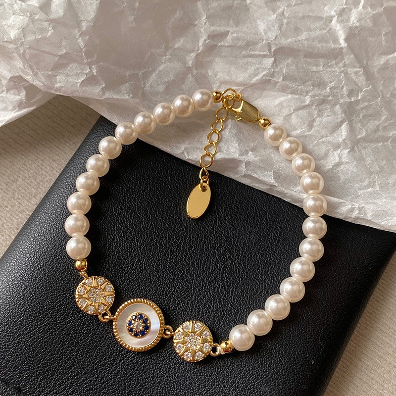 Golden fuchsia bracelet