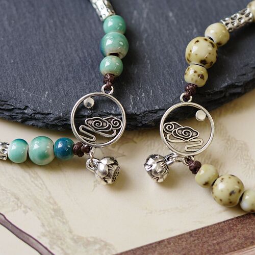 Artistic and cultural auspicious cloud ceramic bracelet female wholesale braided rope new Chinese style national wind fashion lotus pod bracelet jewelry small gift 