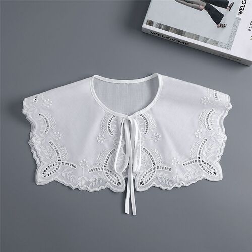 The small shawl woman's cloak matches the summer dress with a lace flower edge collar that is too low, creating an absolutely beautiful faux collar with a water lily design.