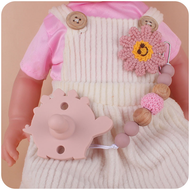 Nuevo bebé de dibujos animados dinosaurio de silicona chupete dientes de bebé juguetes de molienda Amazon AliExpress