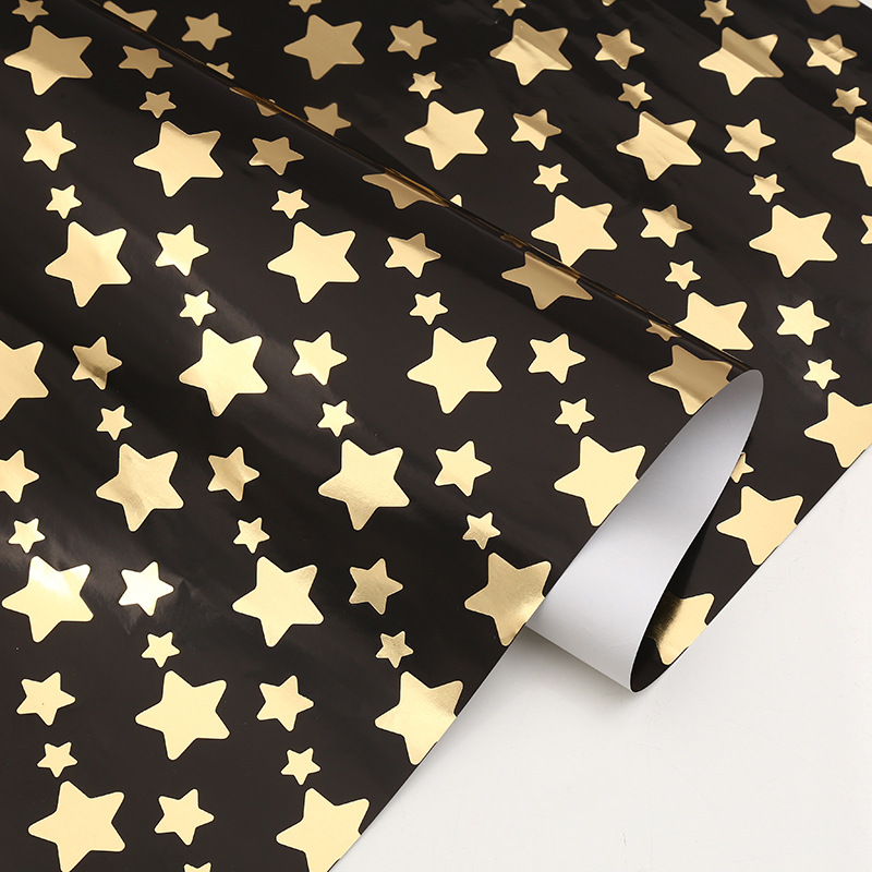 Estrella de cinco puntas de oro sobre fondo negro * 50*70cm