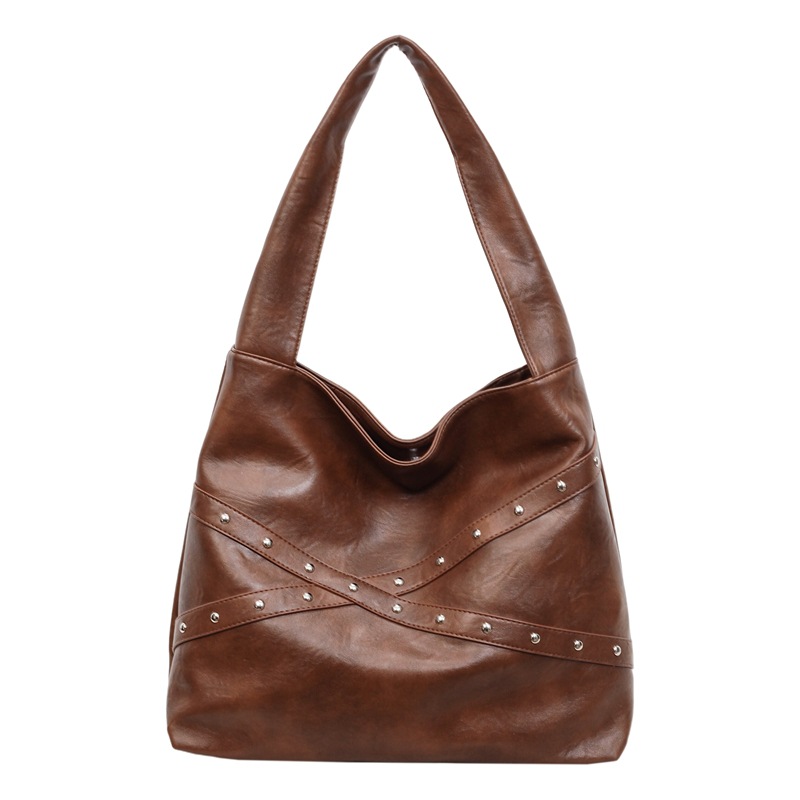 Transfronterizos retro nicho bolsas de cubo portátiles 2025 nuevo transporte de gran capacidad bolsa bolsa de hombro de locomotora