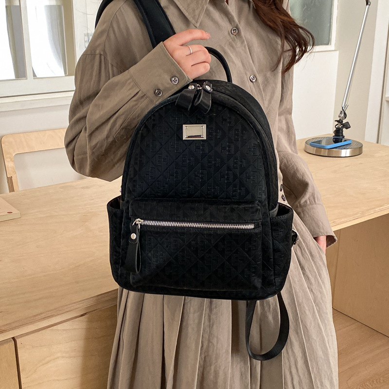 Mochila de moda coreana para mujeres simple color sólido mochila de viaje de gran capacidad 2026 nueva mochila de viaje al trabajo