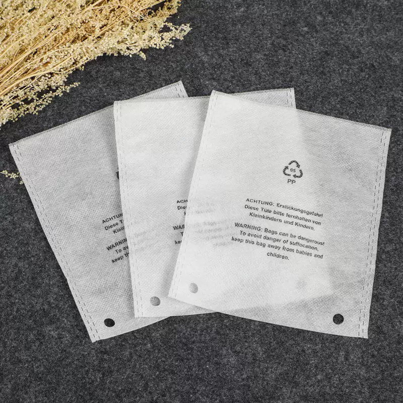 定制打孔无纺布袋鞋服装防尘收纳包装袋子可印logo平口包装袋批发