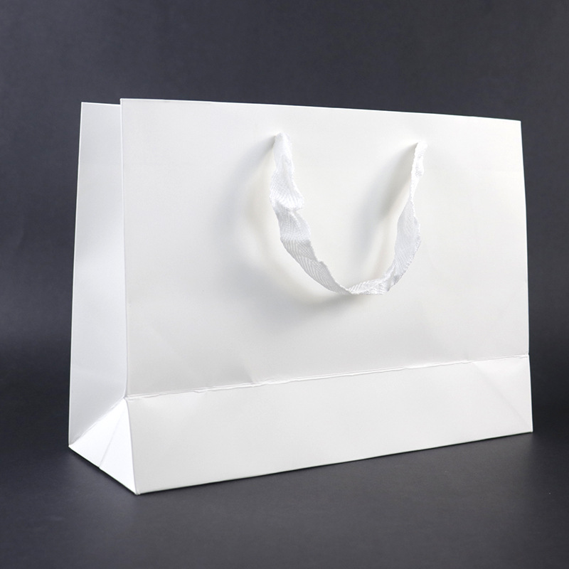 Bolsa de papel portátil, bolsa de ropa, bolsa de compras publicitaria, bolsa de papel para tienda de ropa de gran tamaño para colgar en el hombro, bolsa de regalo blanca pura