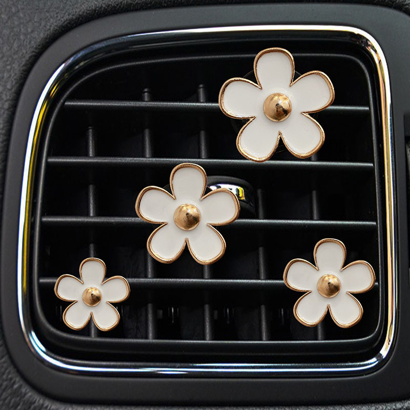 Crisantemo pequeño aire acondicionado salida de aire clip de perfume aleación pequeña margarita flor de cinco pétalos salida de aire del coche decoración de perfume