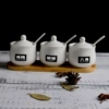 Three drum-shaped wooden seat set