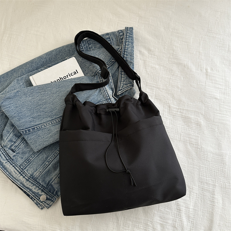 Bolsa de ocio para mujeres 2024 nuevo bolso de tela de verano, bolso de hombro de gran capacidad, bolso de clase, mochila de viaje