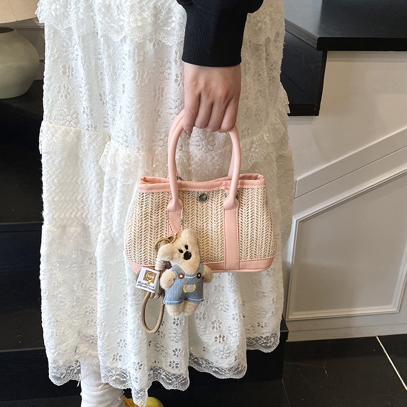2025 verano nuevo bolso bolso de paja portátil de moda versátil para mujer