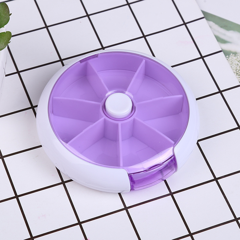 Caja redonda de la píldora de una semana siete-rejilla que gira la Mini caja plástica portátil de siete días de la píldora