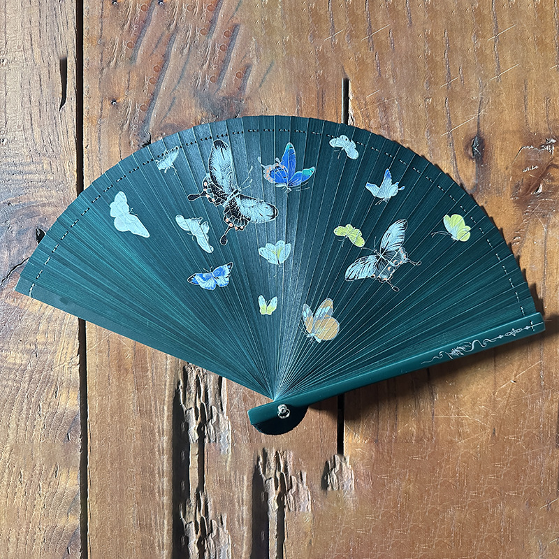 Grúa de estilo chino completo ventilador de bambú talla hueco estilo antiguo ventilador al por mayor han Ropa danza ventilador de mano grúa regalo ventilador