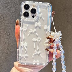 水玉模様の白いリボン Apple 16promax 携帯電話ケース 15plus 透明 14 プレミアム 13 エアバッグ 12 爆発に適しています