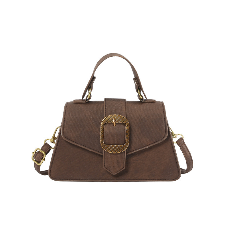 Este año popular bolso de brazo 2024 nueva moda francesa hebilla de cinturón decoración de hombro mochila retro bolso de hombro