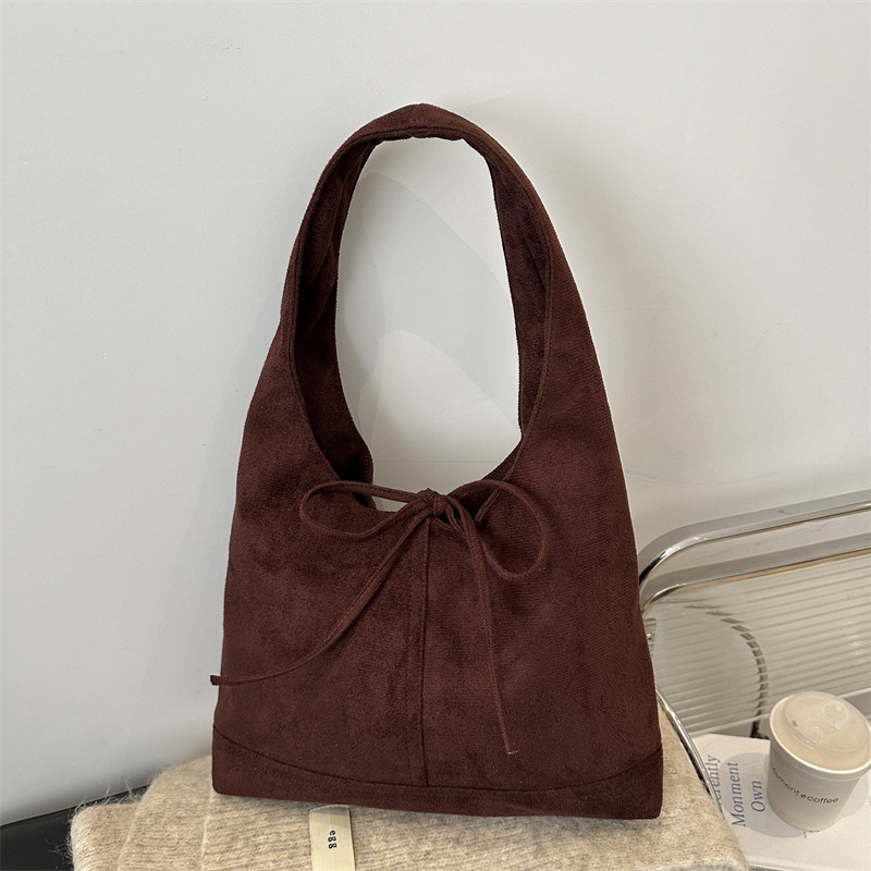 Bajo las axilas de moda retro bolsas de mano para mujeres 2025 primavera nueva moda versátil gran capacidad bolsas de hombro para trabajar