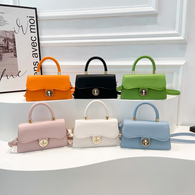 Moda coreana de piel de cera de aceite bolso de mano para mujeres 2025 nuevo estilo de estilo extranjero tendencia de bloqueo bolso de hombro