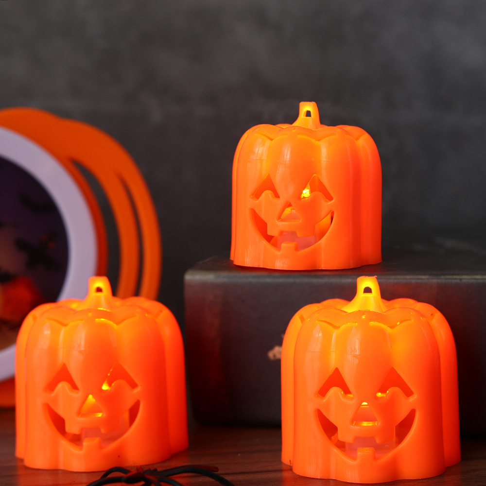 Nuevo Halloween calabaza lámpara fantasma día de decoración props demonio expresión pequeña lámpara de noche LED vela lámpara de mesa al por mayor