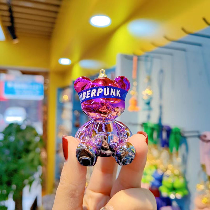 Resina de dibujos animados colorido gradiente oso llavero creativo postura sentada red oso llavero de moda colgante de llave de automóvil