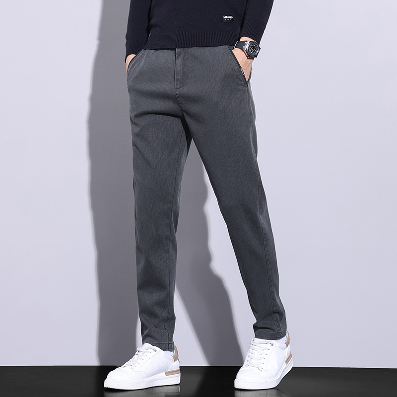 Pantalones juveniles populares para hombres casuales Otoño e Invierno nuevos pantalones antiarrugas resistentes al desgaste pantalones de todos los partidos juveniles elásticos pantalones casuales cómodos