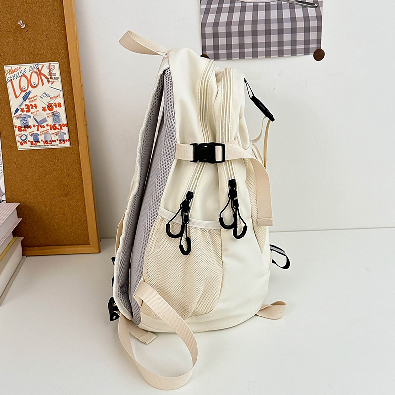 2024 mochila escolar para estudiantes universitarios nueva mochila simple de gran capacidad ocio al aire libre mochila ligera de secundaria al por mayor