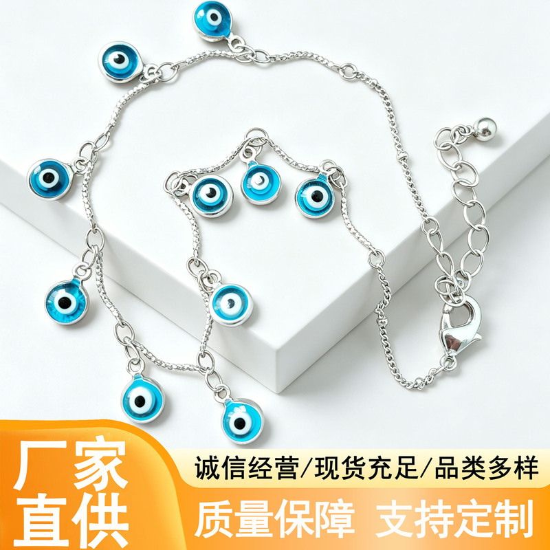 Exotic Bohemian Evil Eye Bracelet with Multiple Blue Eye Pendants, Adjustable Chain Hand Accessory, Ambiance-Enhancing Accessory Exotic Bohemian Evil Eye Bracelet with Multiple Blue Eye Pendants, Adjustable Chain Hand Accessory, Ambiance-Enhancing Accessory
