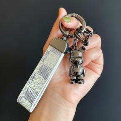 かわいいクリエイティブな金属の暴力的な熊のキーホルダー男性の個性的な古い花の革の車のキーホルダー