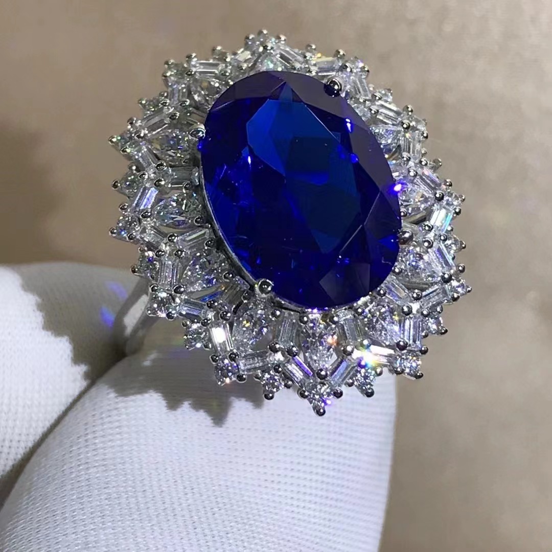 Corte oval anillo de zafiro artificial 8 quilates azul real principal piedra S925 plata con incrustaciones transfronterizas Venta caliente