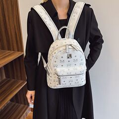 2025新款双肩包女韩版时尚印花书包女士百搭大容量铆钉旅行背包潮