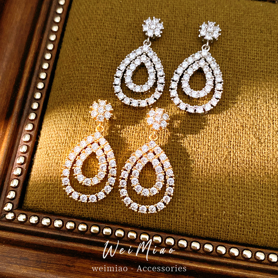 18k oro real chapado aguja de plata de piedra de silicio gota de agua personalidad temperamento pendientes de moda ligero lujo alta sensación de auriculares