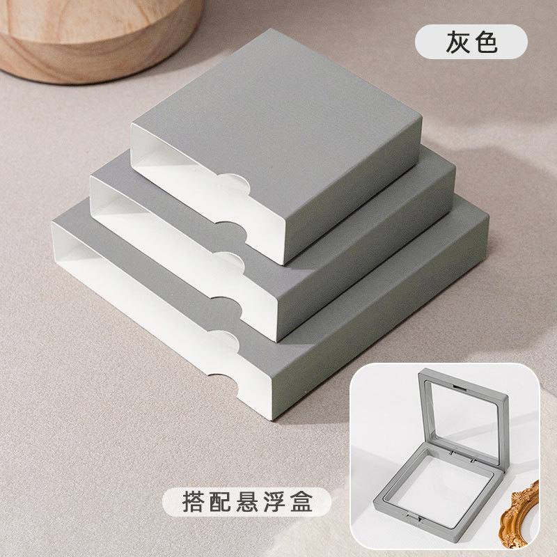 Funda de papel gris (incluida la Caja de suspensión); 7*7*2cm