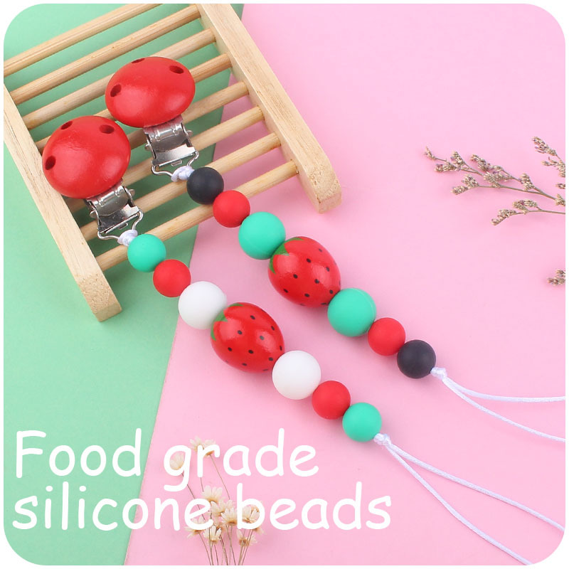 Nuevo bebé suministros de dibujos animados fresa mordedor creativo bebé cuentas de silicona mordida molar Cadena de pezón cadena anti-caída
