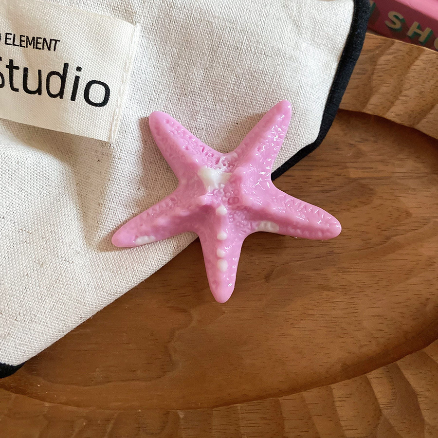 Vacaciones junto al mar viento estrella de mar horquilla moda tendencia de fotografía lateral clip de pico de pato sentido de alta gama accesorios para el cabello de todo fósforo mujeres