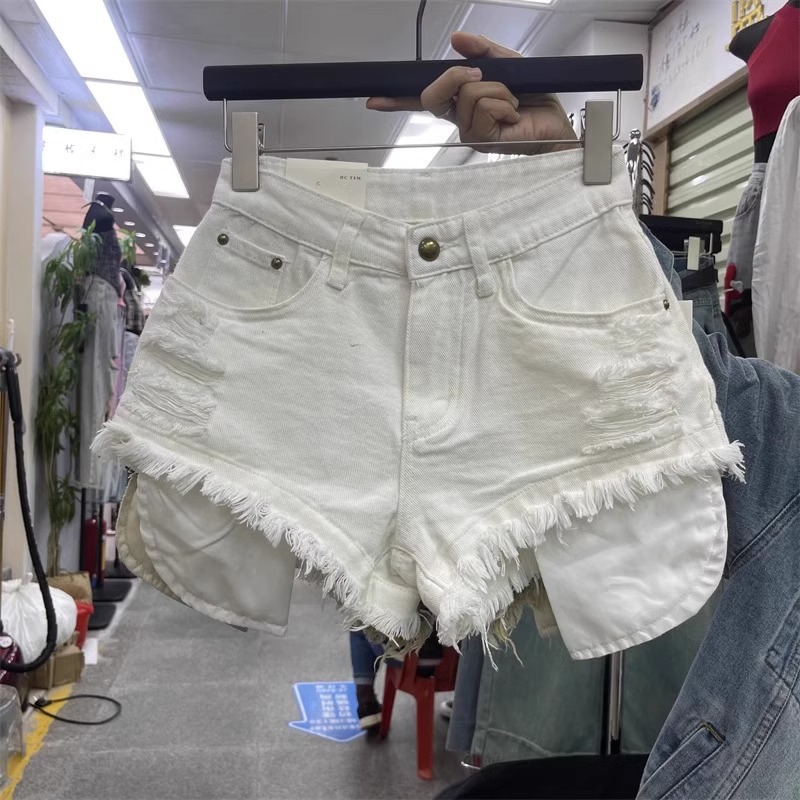 白色毛边辣妹性感漏口袋牛仔阔脚a字热裤显腿长破洞乞丐短裤女潮
