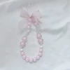 Fuchsia chain with bow, flowered
